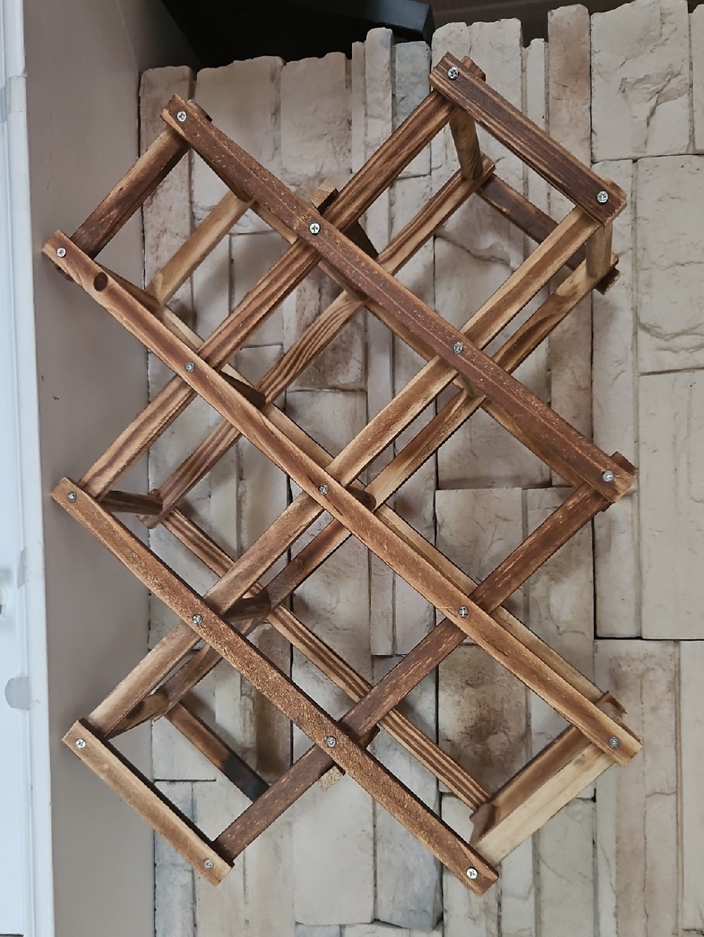 Wood Collapsible Accordian Stlye Wine Rack. Holds Up To 10 Bottles.